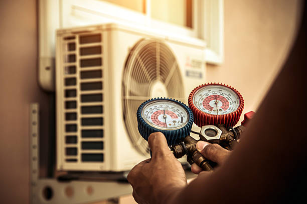 Professional Hvac technician working in Lake Mills, WI
